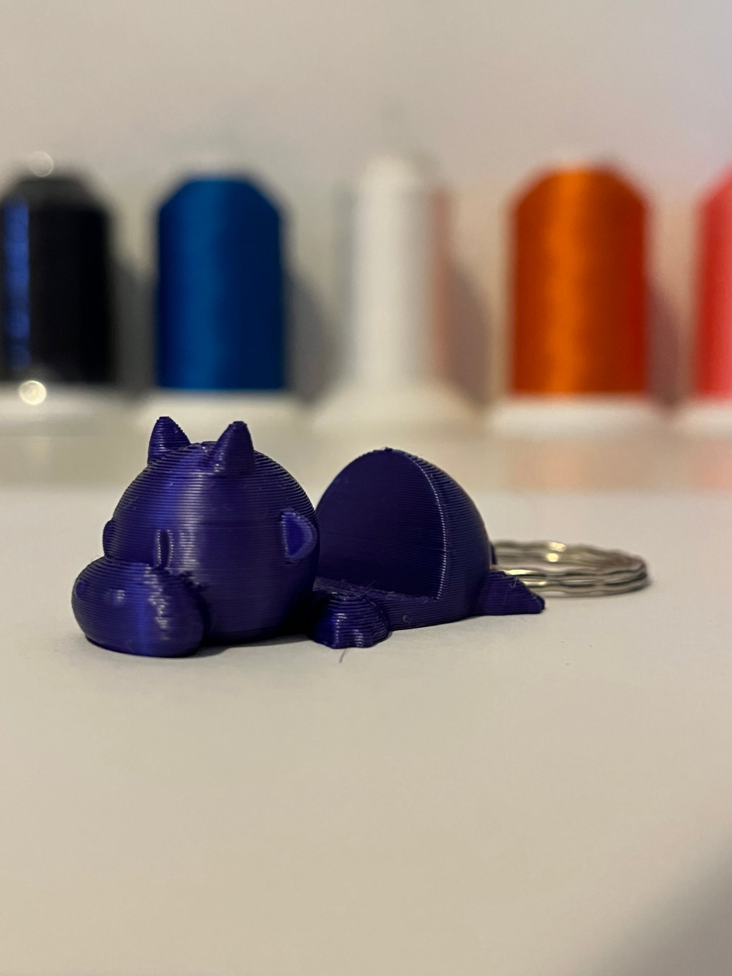 Telefontartós Boci kulcstartó